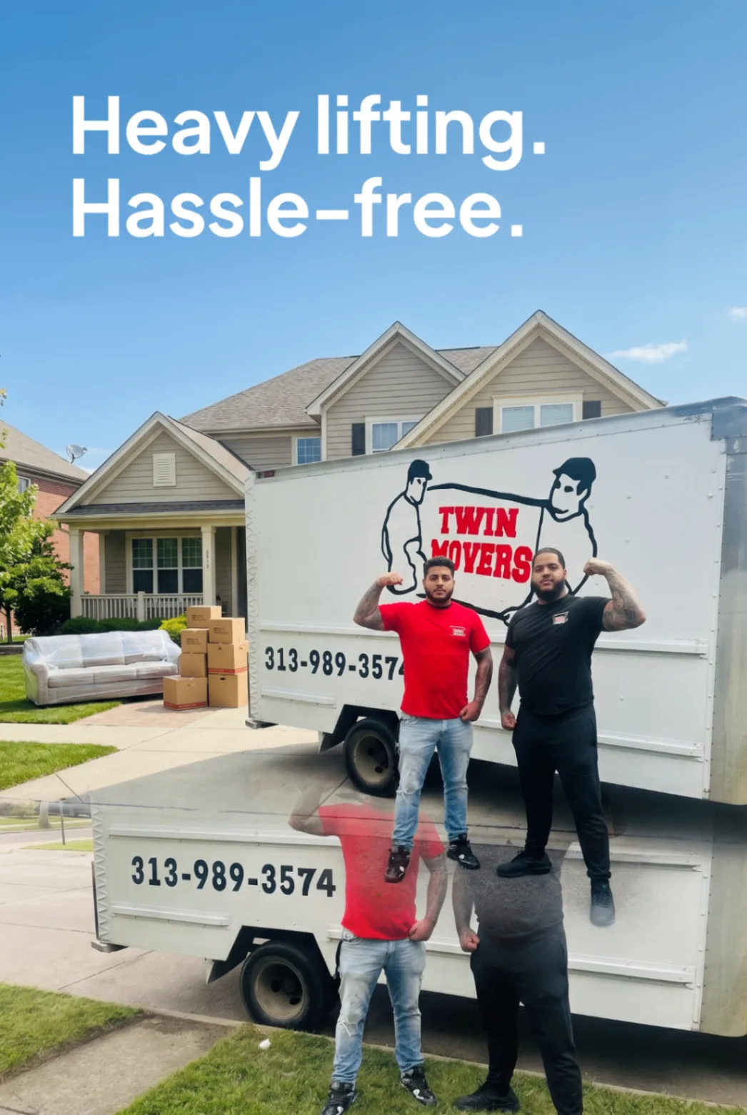 Twin Movers crew standing beside their branded moving truck with the message Heavy lifting. Hassle-free.